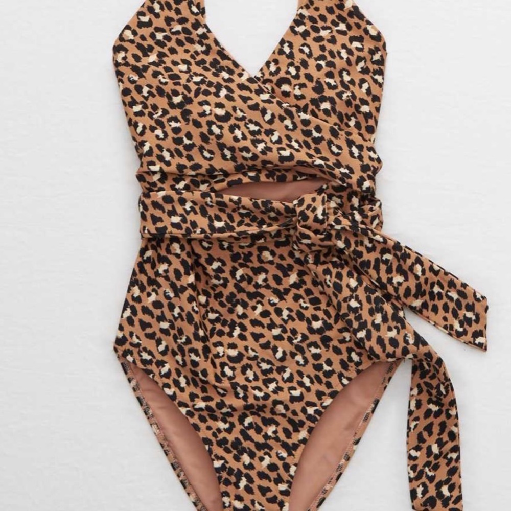 Leopard print one piece suit. Belted waist.